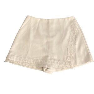 NBD White Wrap Skort with Lace Trim. Size M. Zipper back. Cute!